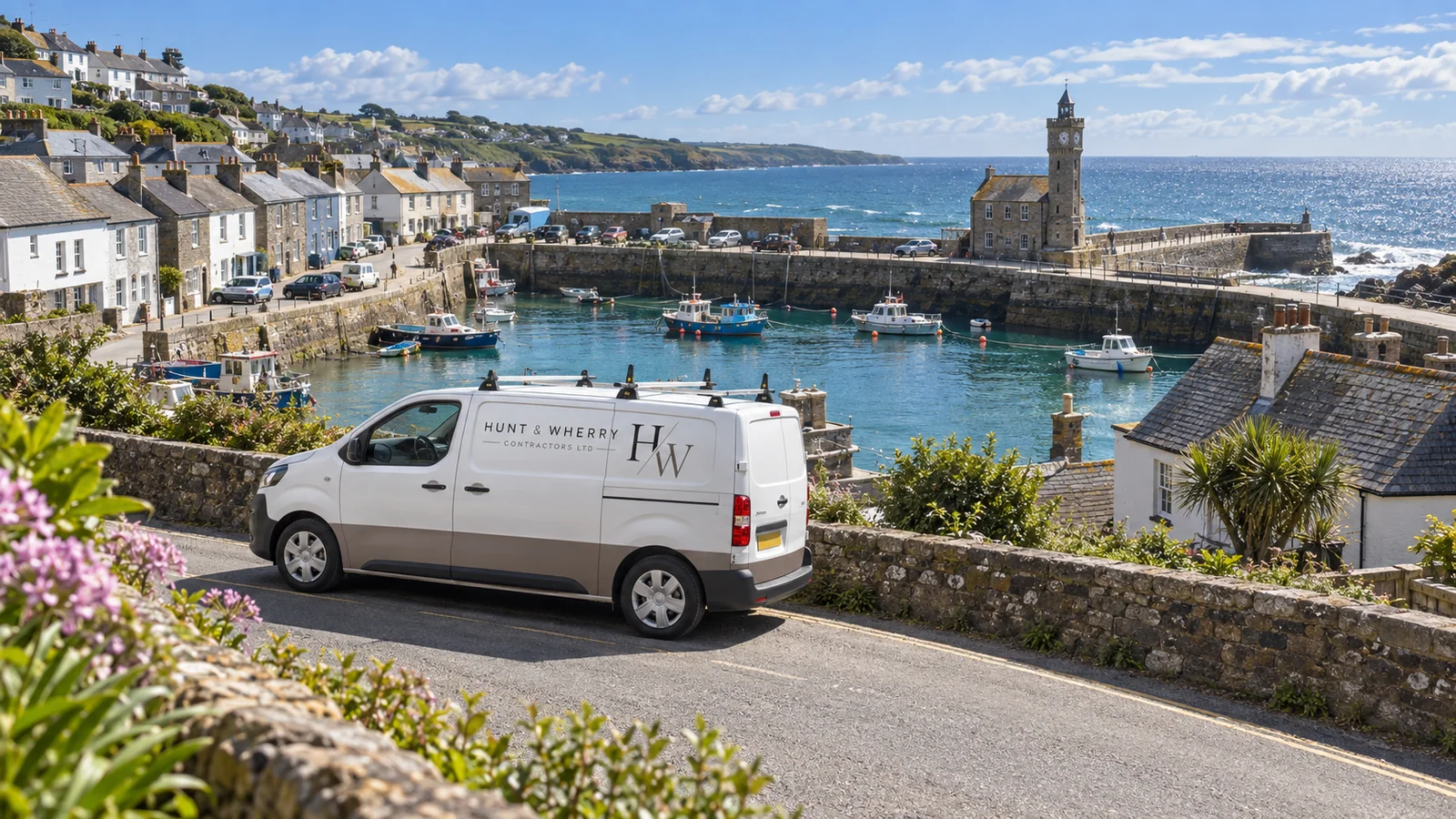 Porcelain paved terrace laid in a coastal garden above the harbour in Porthleven